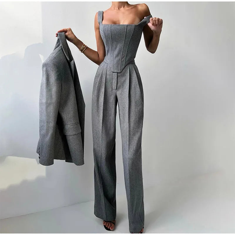 Gray herringbone jumpsuit with blazer and wide pants side view