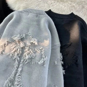 Hoody met franje detail in lichtblauw en zwart, zijprofiel