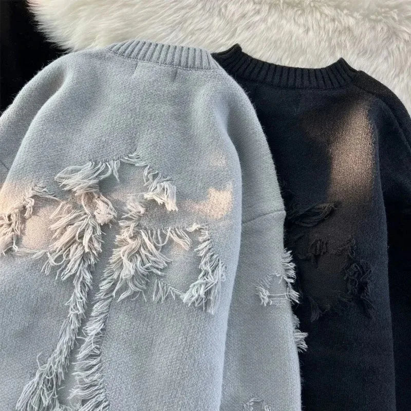 Hoody met franje detail in lichtblauw en zwart, zijprofiel