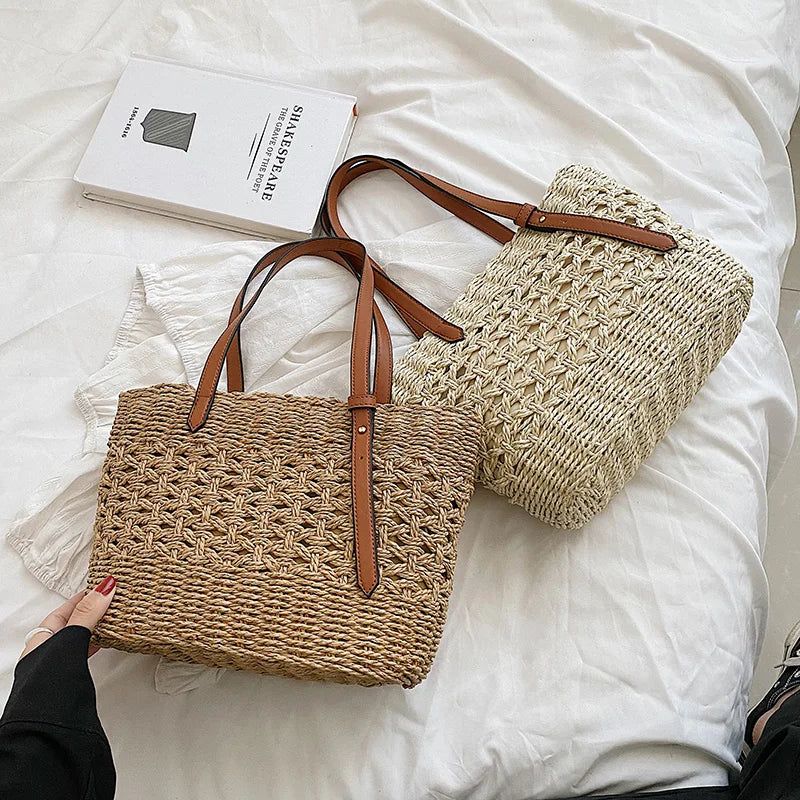 Woven cross-stitch tote bag beige on bed with book