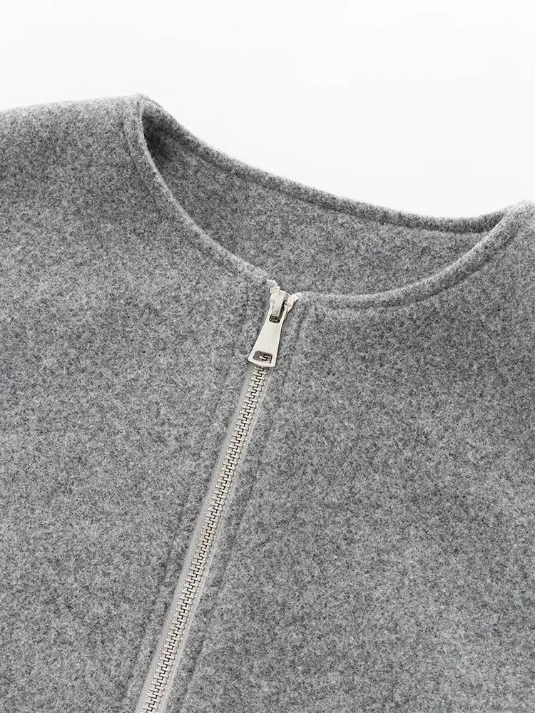 Grijze bomberjas met ritsdetail close-up