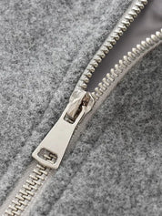 Grijze bomberjas met zilveren rits detail