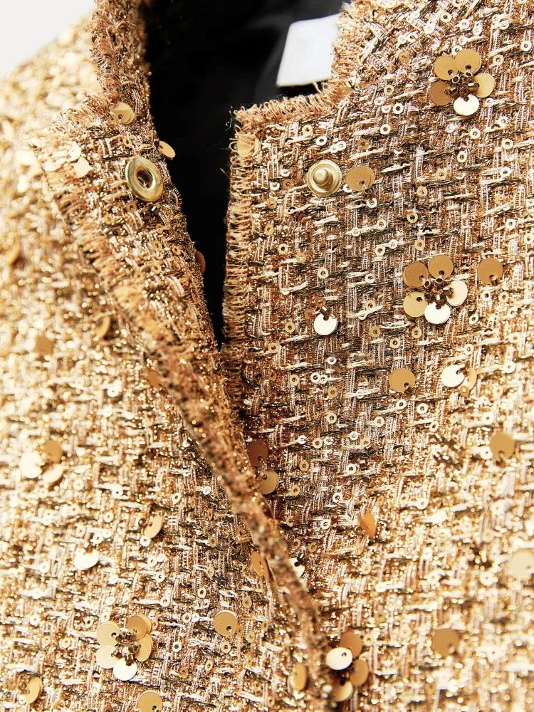 Jas met gouden sequins en knopen detail shot