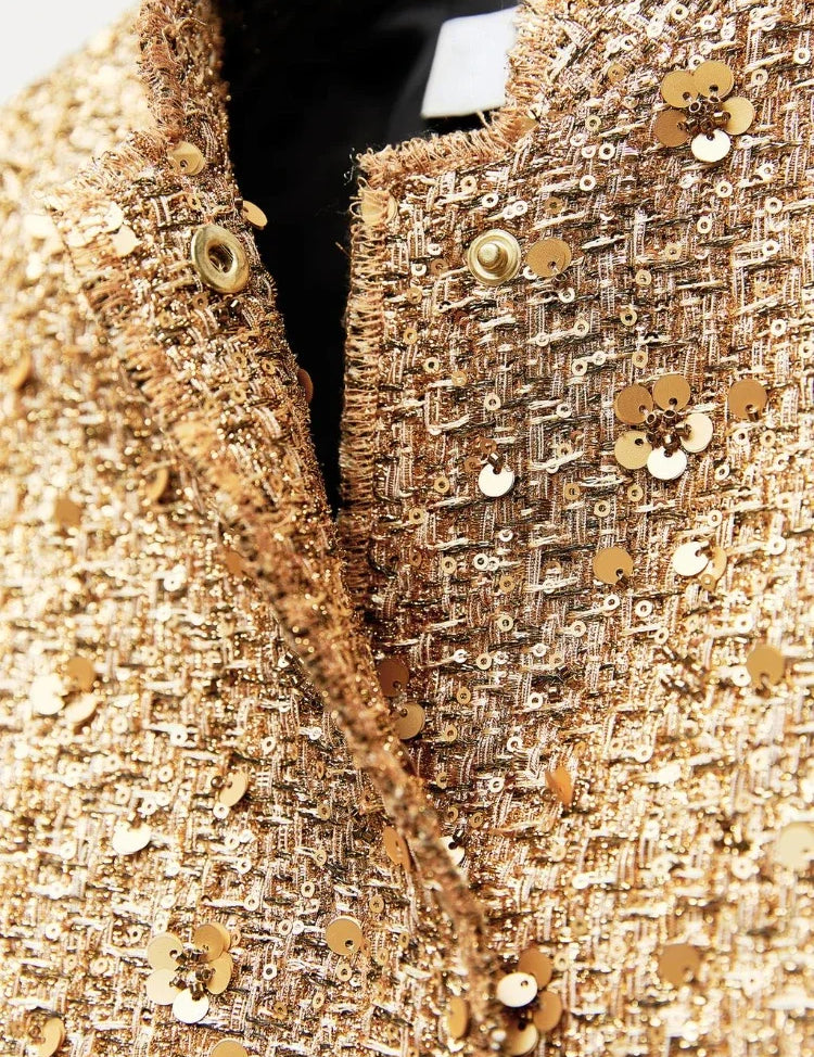 Jas met gouden sequins en knopen detail shot