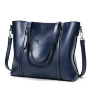 Blue faux leather tote bag front view