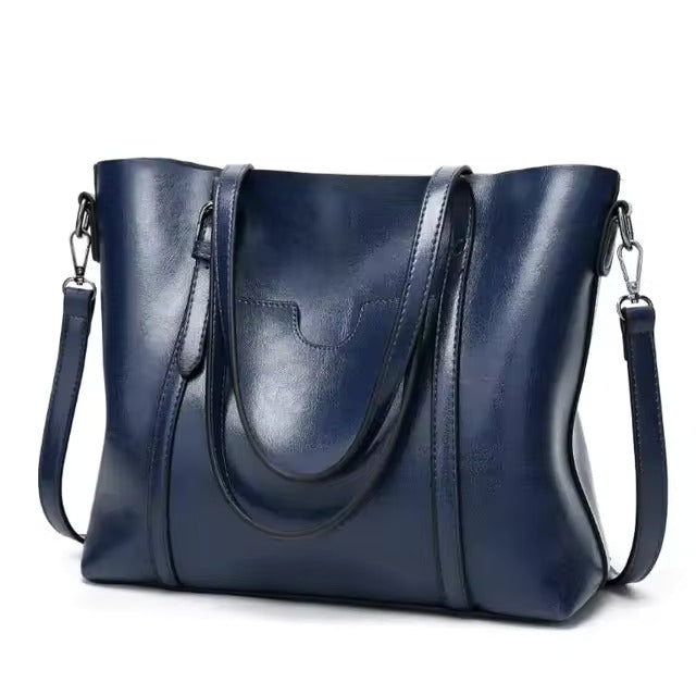 Blue faux leather tote bag front view