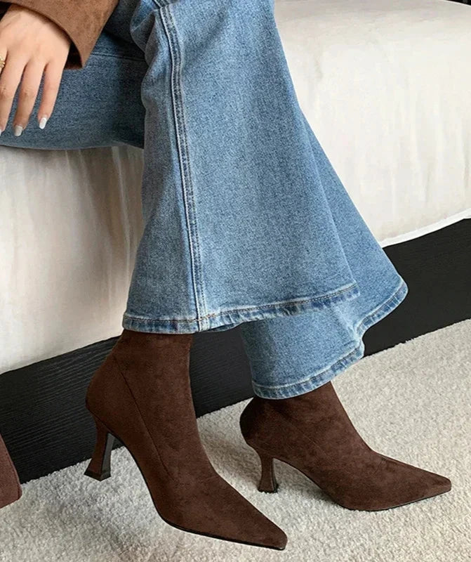 Brown suede ankle boots with pointed toe, side view