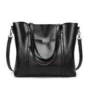 Black faux leather tote bag front view