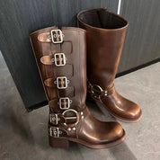 Brown leather biker boots with buckles, close-up detail shot