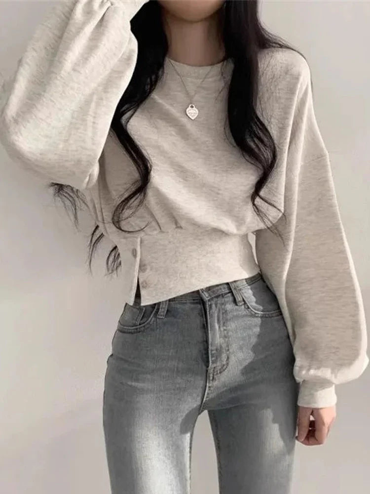 Hoodie beige met lange mouwen en knoopdetails front view