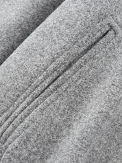 Grijze bomberjas met ritsdetail close-up