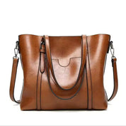 Brown tote bag front view with slight tilt