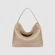 Beige woven hobo bag front view