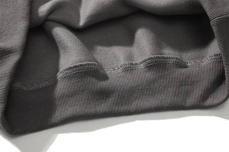 Grijze hoodie met elastische zoomdetail close-up