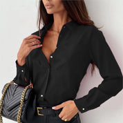 Black classic blouse front view with belt and bag