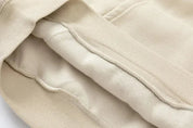 Oversized hoodie beige close-up detail shot