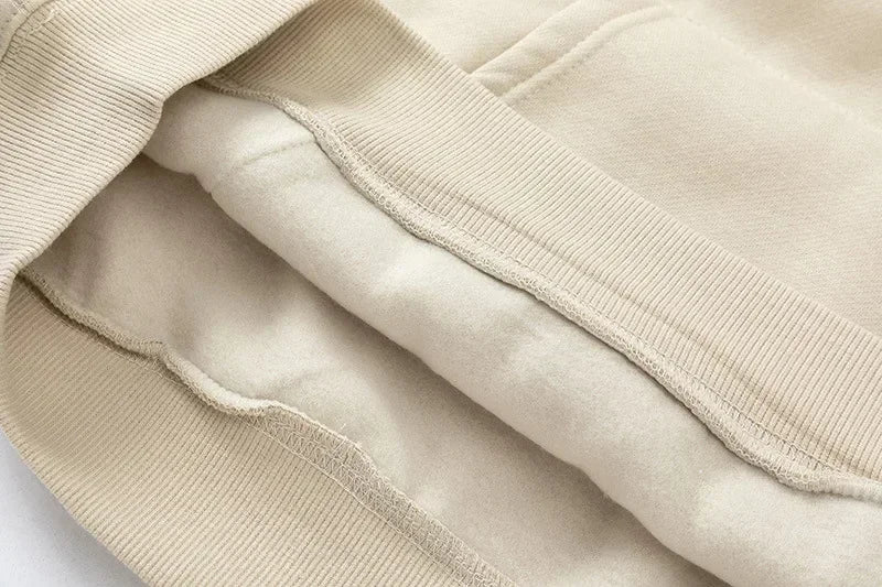 Oversized hoodie beige close-up detail shot