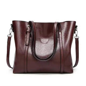 Dark red tote bag front view with slight tilt