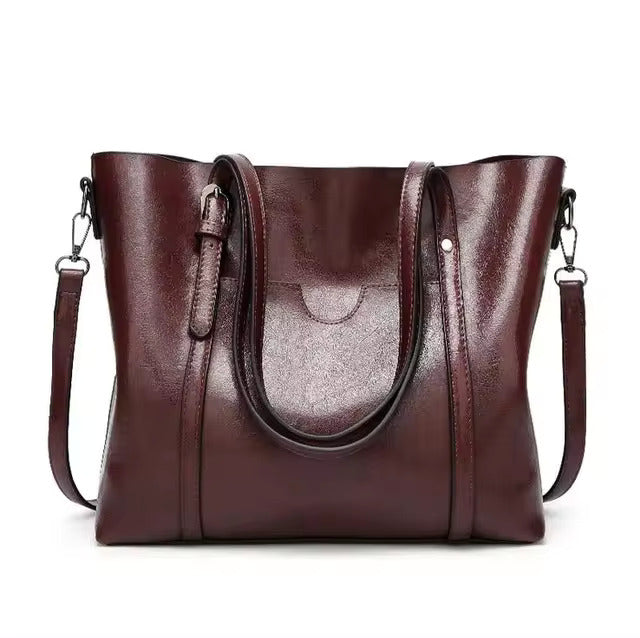 Dark red tote bag front view with slight tilt