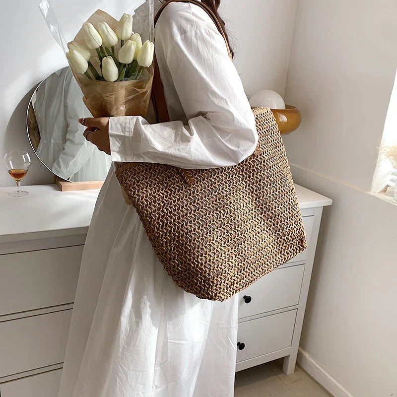 Woven straw tote bag beige worn with white shirt