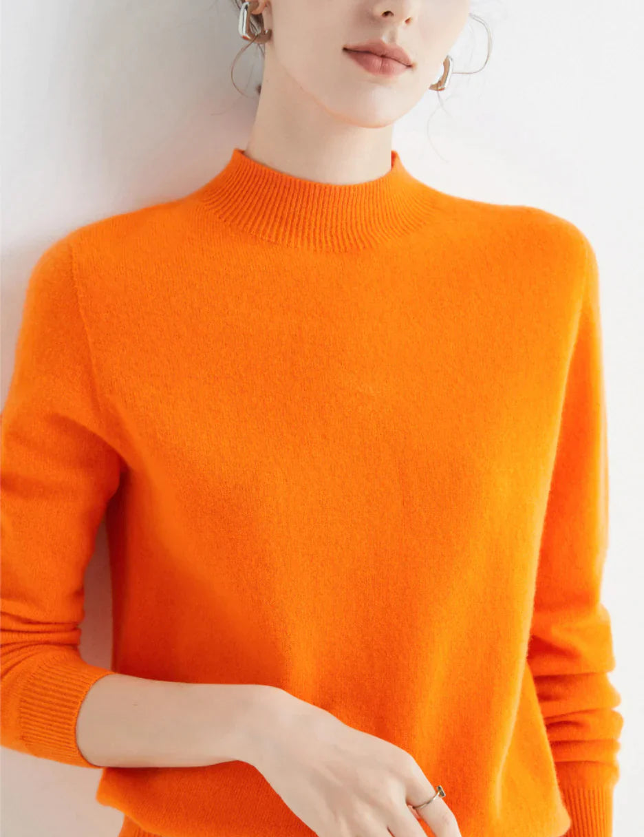 Trui oranje kasjmier halve hals vooruitschot