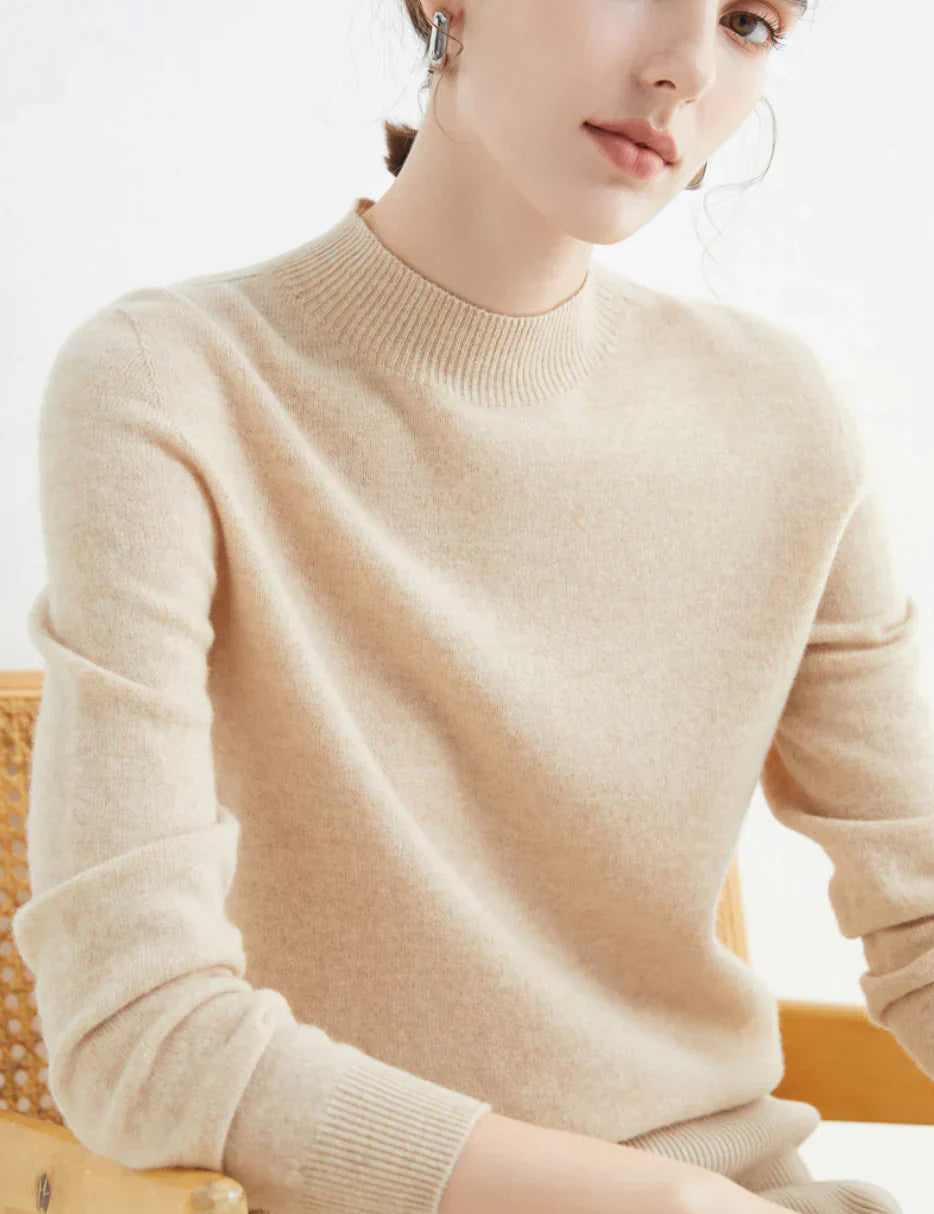 Trui van kasjmier crèmekleurig met ronde hals en lange mouwen