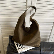 Suede tas Gigi bruin met handvat detail