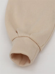 Tweedelig huispak dames beige detail mouw