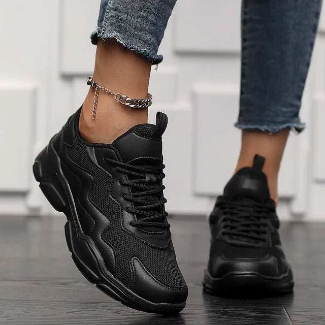 Chunky sneakers all black side view