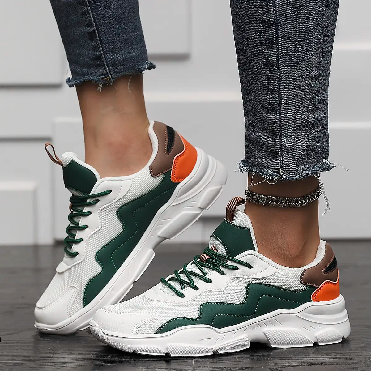 Chunky sneakers white with green and orange accents side view