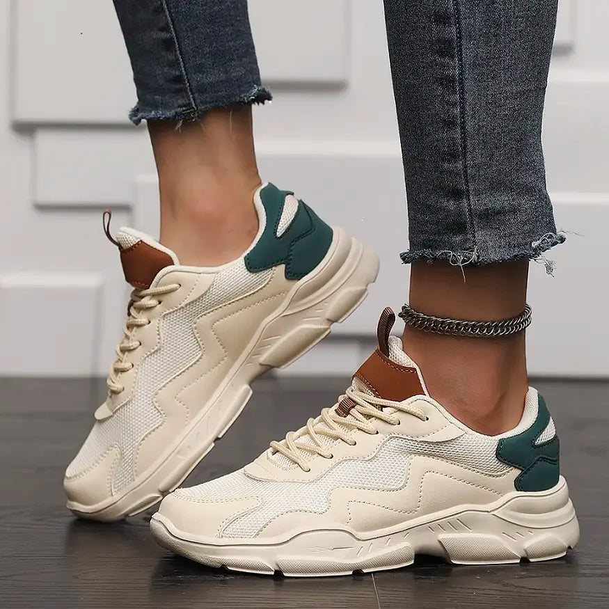Chunky sneakers white with green and brown accents front view
