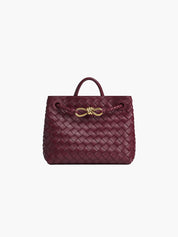Handtas donkerrood gevlochten leer front view