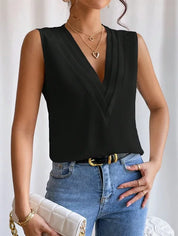 Black blouse with V-neck and pleats, front view