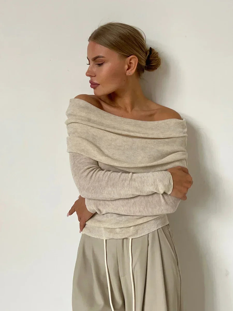 Beige off-shoulder ribbed sweater close-up