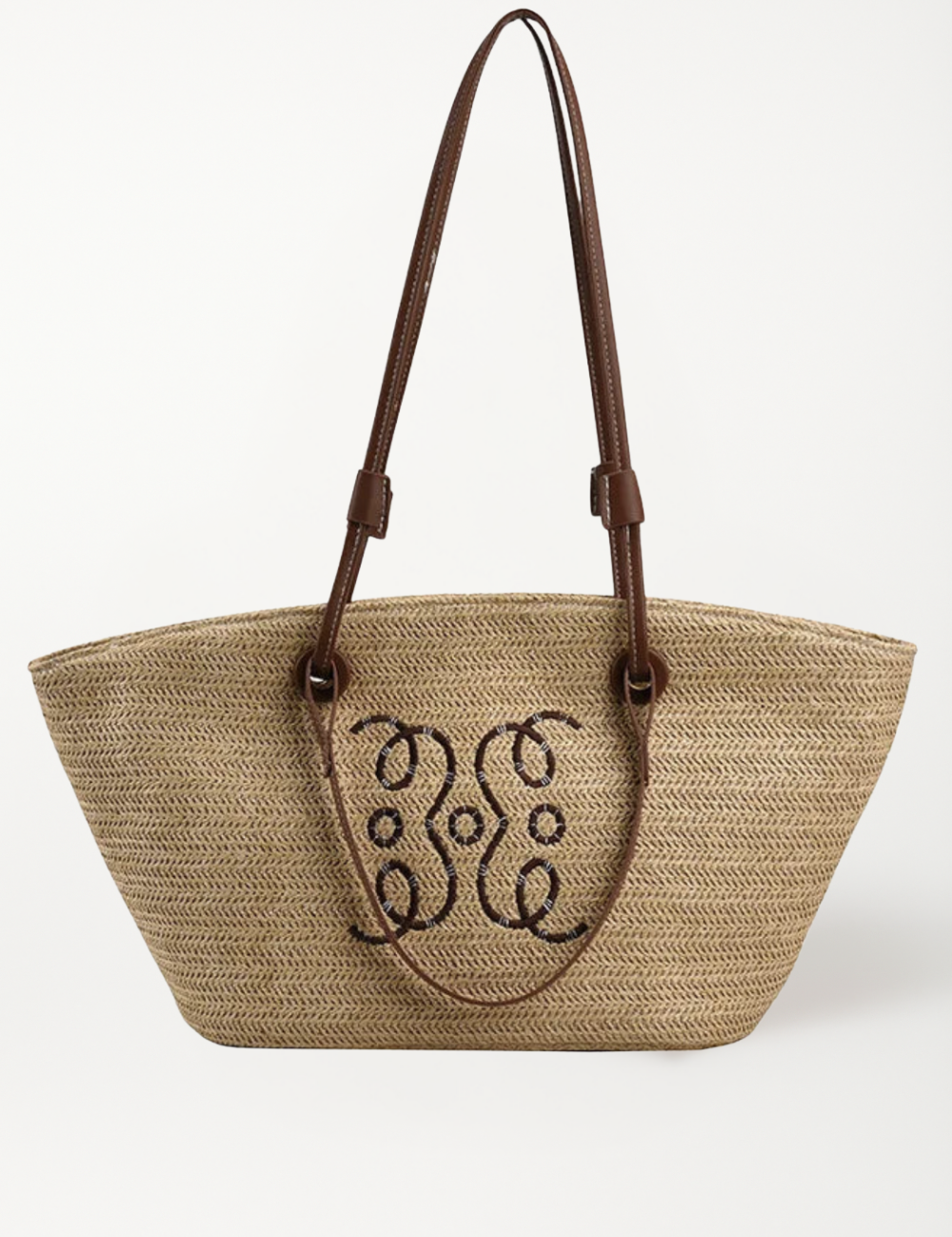 Woven straw tote bag with monogram detail front view