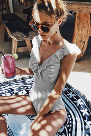 Badpak gestreept zwart-wit zijkant