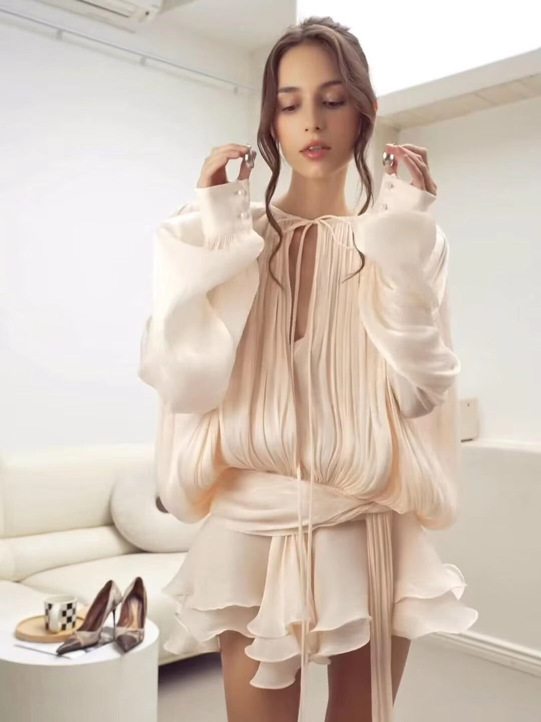 Jurk lichtroze met plooien en ruches voorzijde