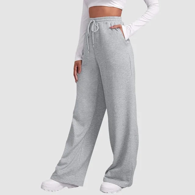 Damesbroek grijze joggingbroek met elastische taille en zakken, achterzijde