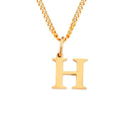 Halsketting met gouden letter H en kubusketting front view