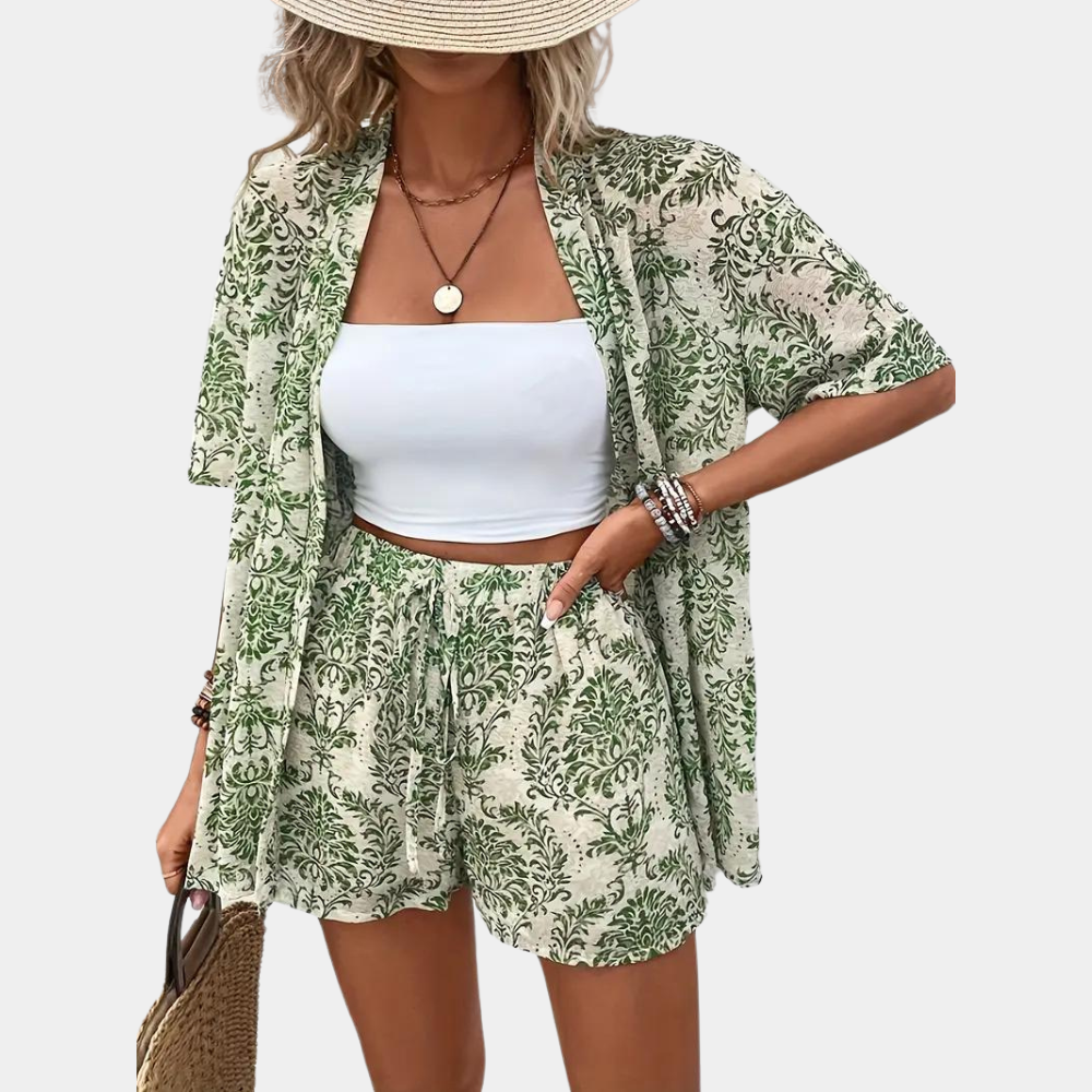 Two-piece set with green floral print and white crop top, front view.