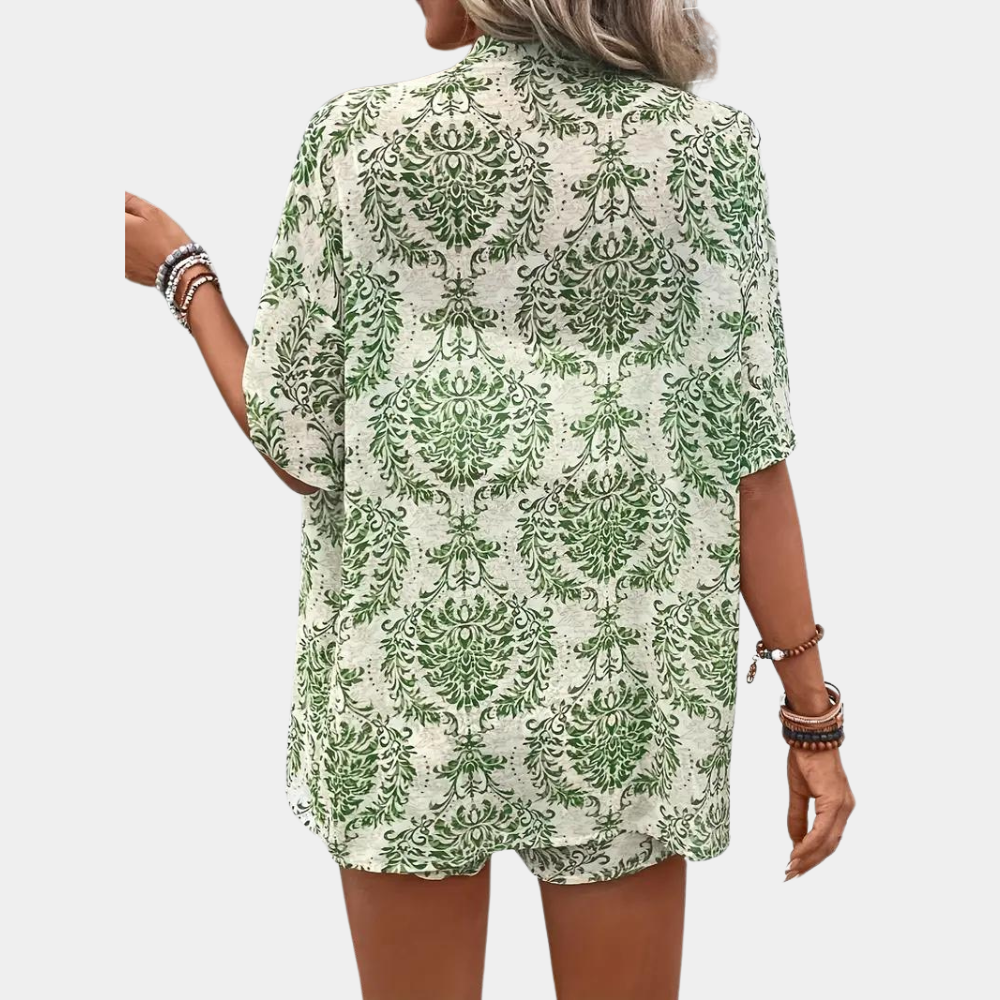 Two-piece set with green floral print and white crop top, back view.