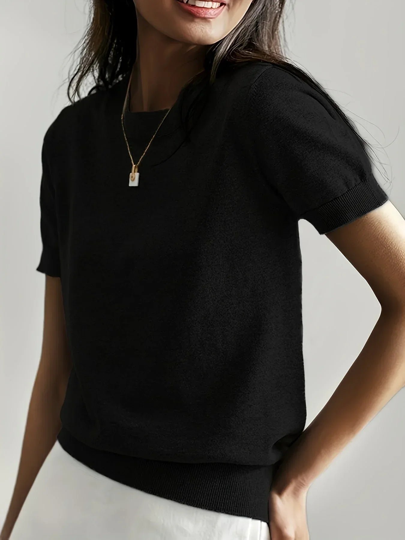 Knitted top black short sleeves front view
