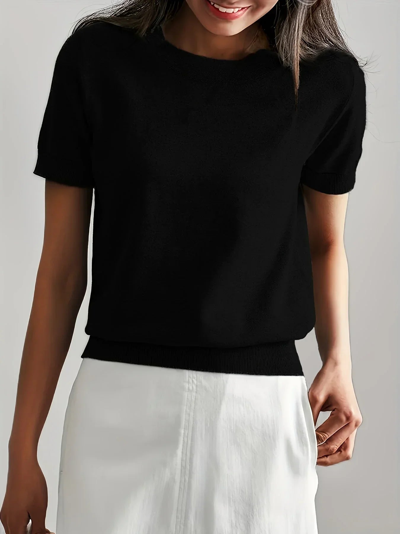 Knitted top black short sleeves side view