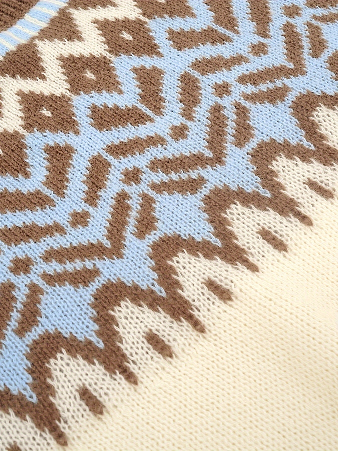 Trui met geometrisch patroon beige en wit detail shot