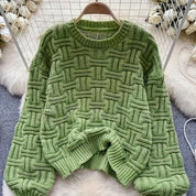 Gebreide trui groen met ronde hals en textuur detail