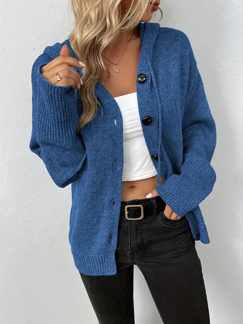 Blue knit cardigan with buttons and white top front view