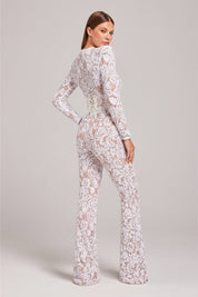 Kanten jurk witte jumpsuit met strikdetail zijprofiel