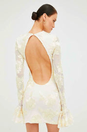White embroidered mini dress with open back detail