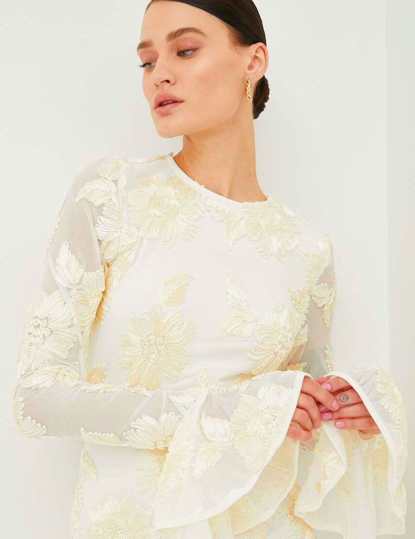 White embroidered mini dress with bell sleeves side profile