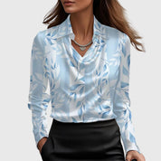 Silk blouse light blue with leaf pattern front view